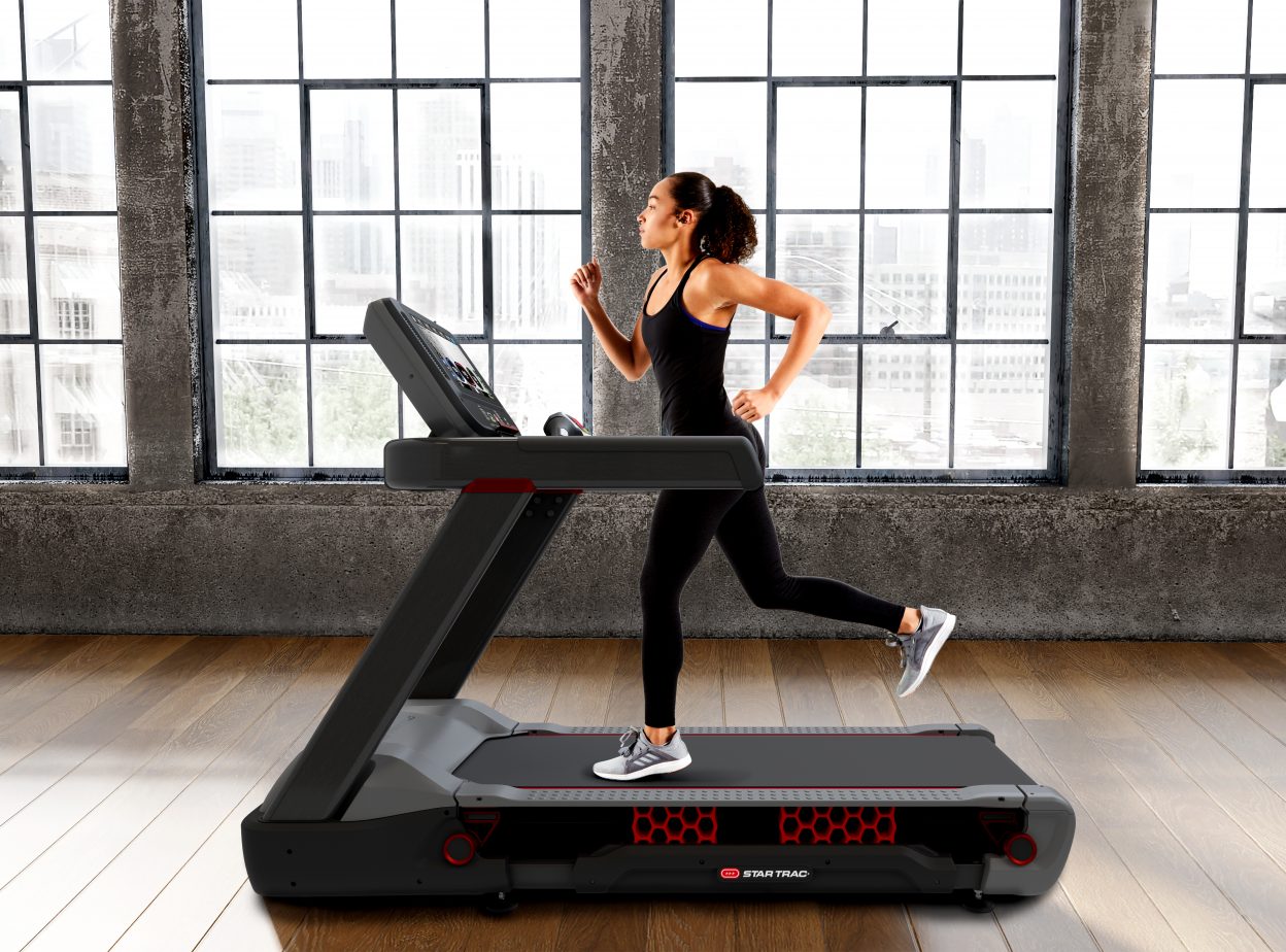 Star Trac FreeRunner Female Model 6 Industrial Studio Lifestyle Image